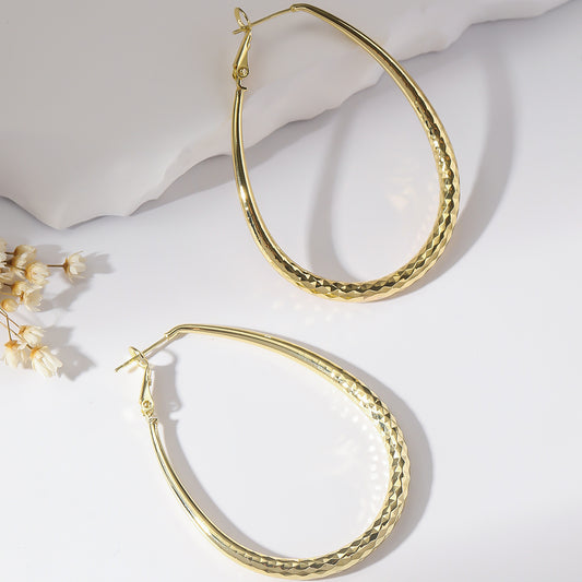 Radiant Teardrop Hoop Earrings in Polished Gold